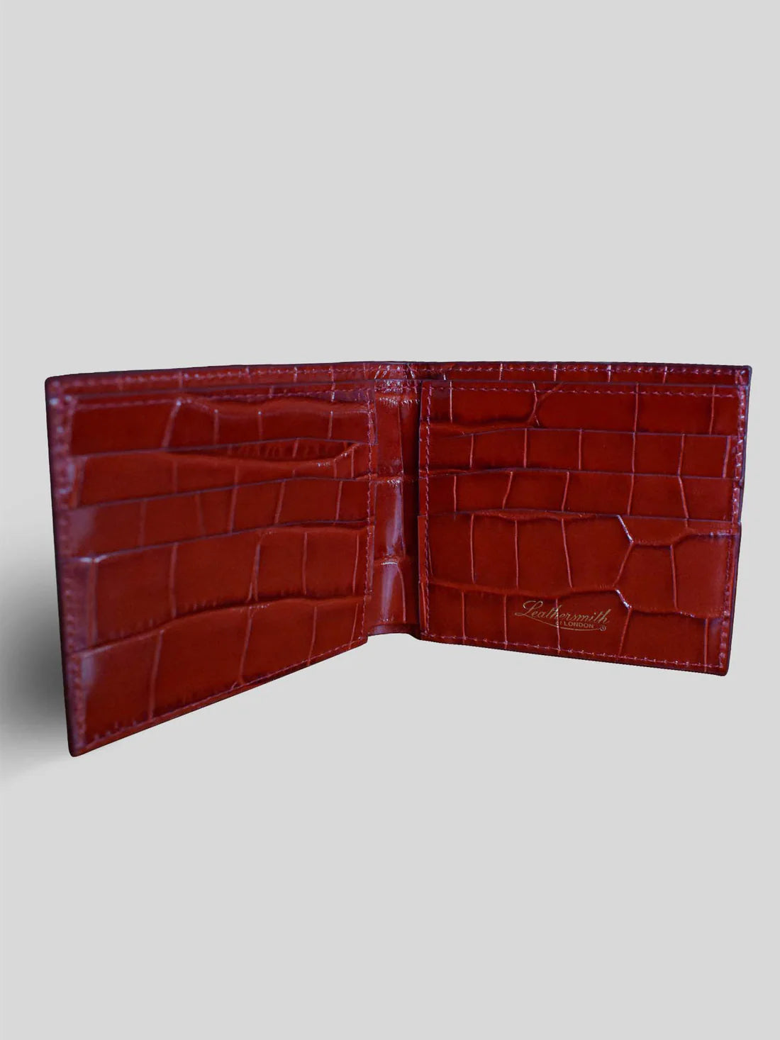 PORTE-CARTES À DEUX VOLETS EN CUIR CROCO ROUGE